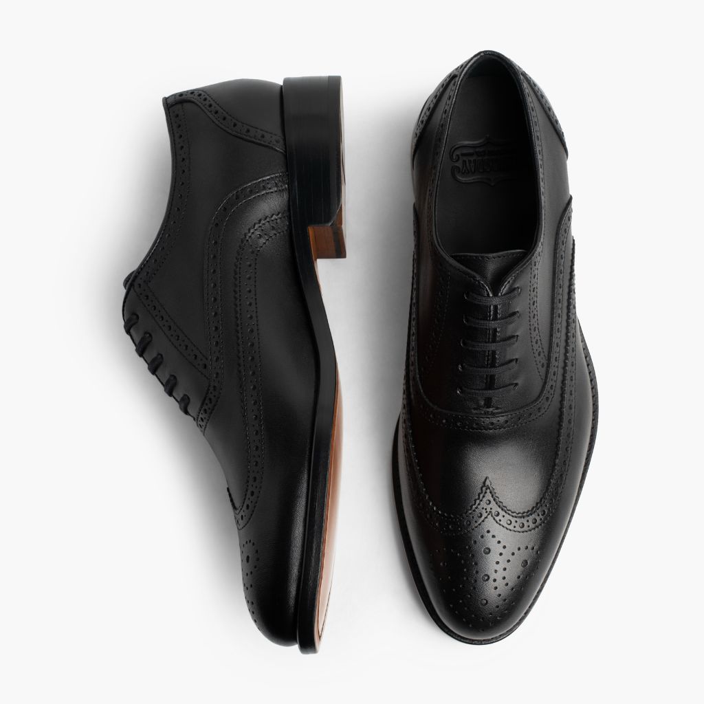 Aviator Noir Mocassins en cuir pour Homme - Vue de profil mettant en valeur la coupe de manche ergonomique