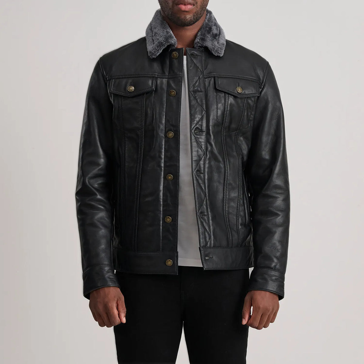 Dallis Noir Leather Shearling Trucker Veste en Cuir pour Homme in Black Sheepskin Leather - Vue de face &amp; silhouette ajustée | Acheter en ligne