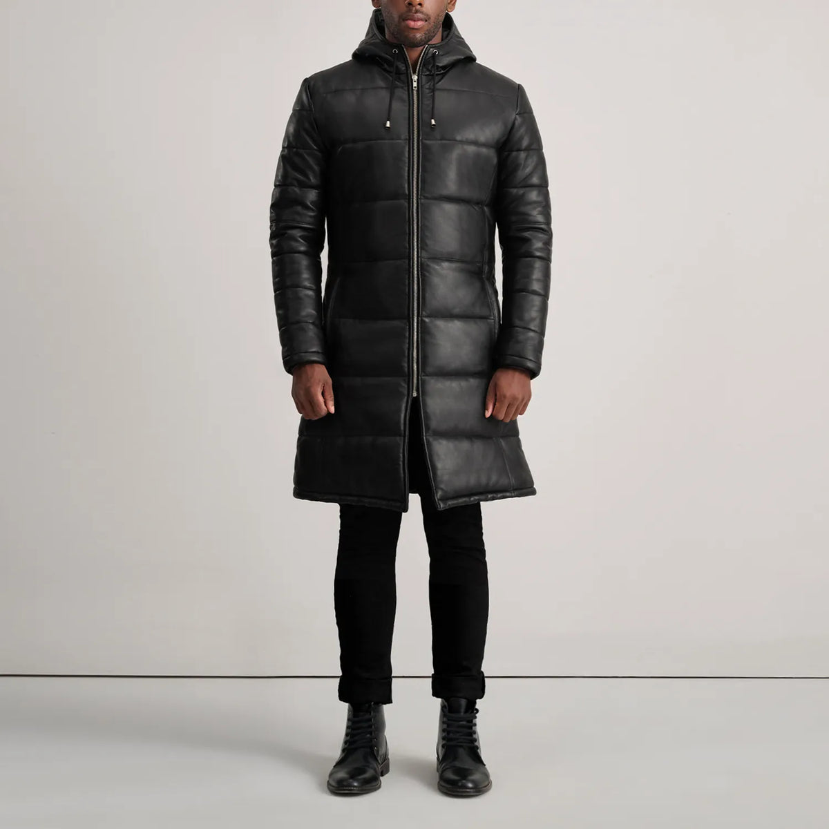 
Floyd Tan Hooded Leather Puffer Coat - Vue de profil mettant en valeur la coupe de manche ergonomique