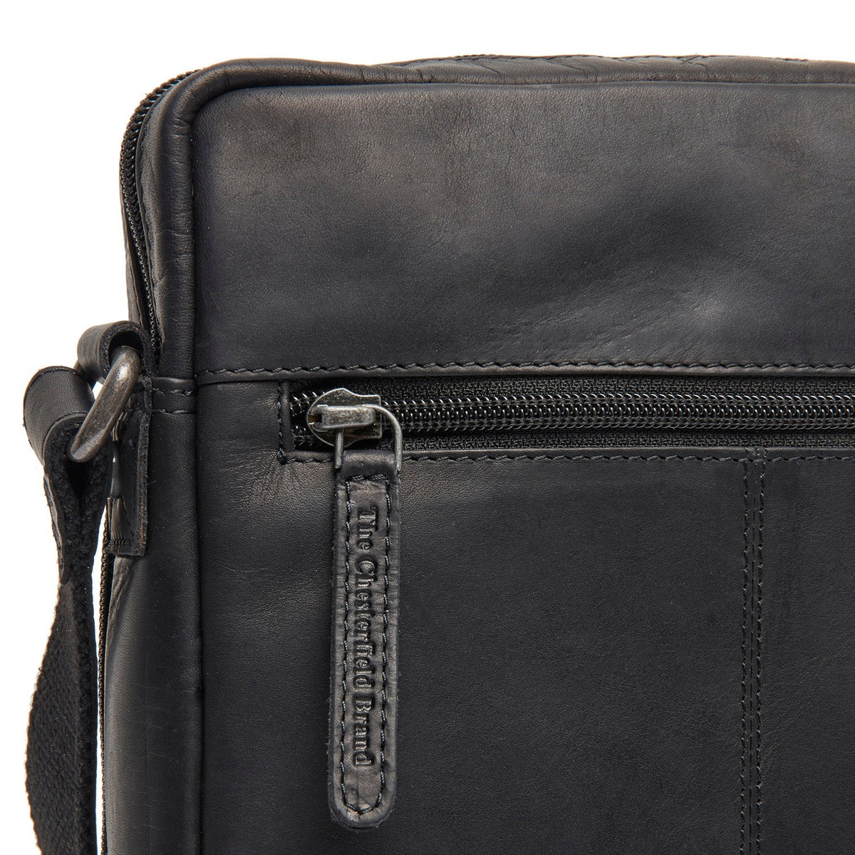 Solid Antique Brass Hardware & Heavy-Duty Dual Zipper Detail on Montira Full-Grain Leather Crossbody Bag