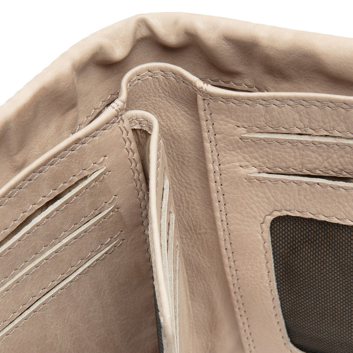 Solid Antique Brass Hardware & Heavy-Duty Dual Zipper Detail on Mavona Full-Grain Leather Wallet