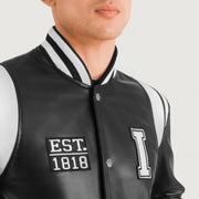 
Vue détaillée of Varsity & Snap Button Hardware on Liberte Illinois Noir Leather Varsity Veste en Cuir pour Homme