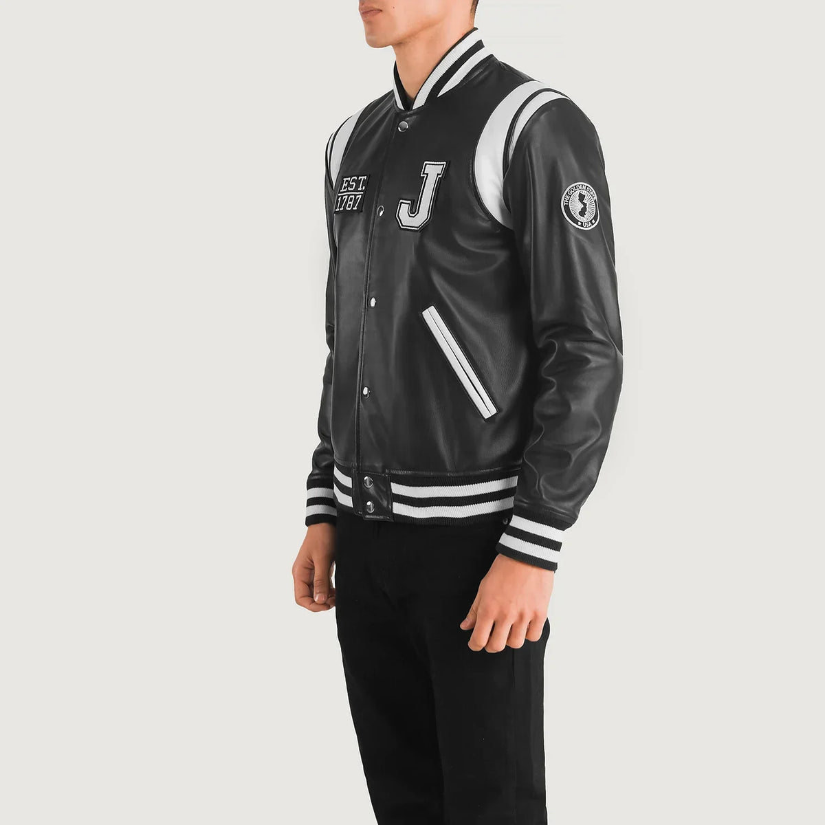 
Black & White Sheepskin Leather Varsity Jacket - Vue arrière montrant la carrure ajustée et l'ourlet net