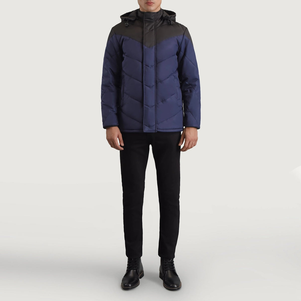 
Luka Noir & Bleu Hooded Puffer Veste en Cuir pour Homme - Vue de profil mettant en valeur la coupe de manche ergonomique