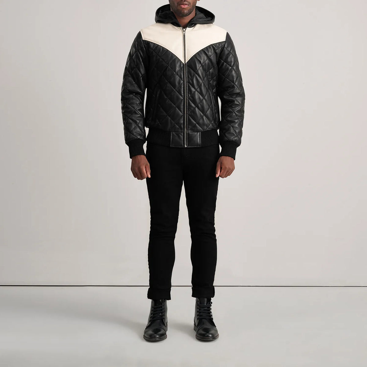 
Norman Tan Hooded Bomber Leather Puffer Jacket - Vue de profil mettant en valeur la coupe de manche ergonomique