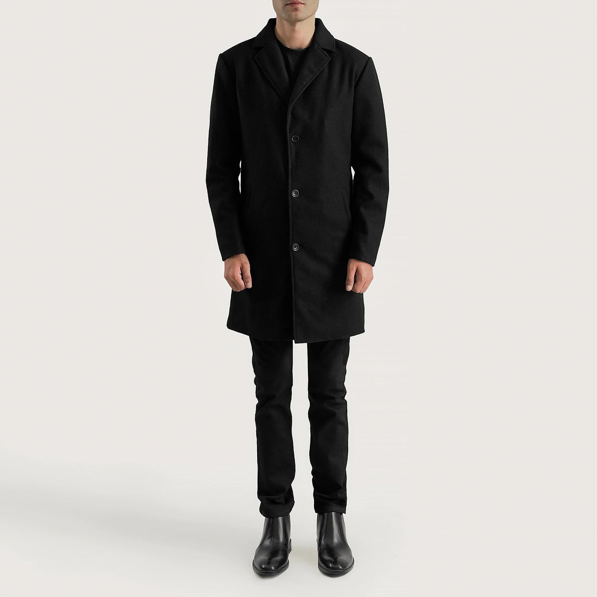 
Petrillo Noir Wool Single Breasted Manteau en Cuir pour Homme - Vue de profil mettant en valeur la coupe de manche ergonomique