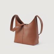 
The Stefani Brown Leather Hobo Bag For Women - Vue de profil mettant en valeur la coupe de manche ergonomique